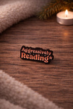 Aggressively Reading Enamel Pin | Book Lover Humor Badge | Gold-Tone Bookish Accessory